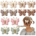 Detailed macro view of twelve handmade crocheted butterfly hair clips in soft assorted colors - Five-Color Vibrant Mix (12B) / Set of 12