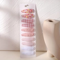 Set di 10 mollette per capelli per bambine con motivi floreali e quadri rosa su sfondo bianco - Stile Floreale Rosa e Rilievo (10F)
