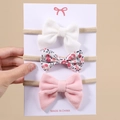 3er-Pack Baby Stirnbänder mit weißen, geblümten und rosa Cord-Schleifen auf Nylonband - 3D-Stereoskopisch