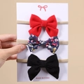 Baby bow headband set with red plush, navy floral, and black corduroy styles - 3L