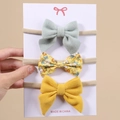 Baby Haarband Set mit Cord- und Blumenschleifen in Gelb und Grün auf Displaykarte - Stil 3K