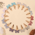 Set di 16 mollette per capelli a farfalla glitterate per ragazze in colori assortiti - 5202-16B