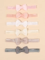 Set van 6 elastische babyhaarbanden met dubbele strikken in diverse pastelkleuren - 6 Stuks (6B)