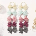 Detailed view of handmade bow hair ties set with ribbed grosgrain ribbon texture - Style 10D