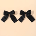 Close-up of a pair of black satin hair clips with long ribbons in a sweet bow design - Black (2A-4)