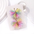 Détail de pinces à cheveux papillon en tulle dégradé avec corps en fil doré sur carte - 2A-10