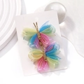 Vue détaillée des barrettes papillon en organza dégradé avec accents en fil doré - 2A-11