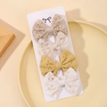 Set di quattro fermagli per capelli con fiocchi in pizzo e ricamo in beige e giallo - Set 4 Pezzi Pizzo Traforato (4J)