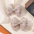 Barrettes nœuds en ruban rose champagne avec perles blanches et centre pailleté - Beige (2A-823)