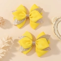 Pair of bright yellow glitter bow hair clips made of ribbed fabric for girls' parties - Bright Yellow (2A-1)
