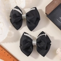 Paire de nœuds pour cheveux faits main noirs avec perles blanches et centre pailleté - Noir (2A-4)