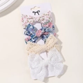 Detailansicht von 4-teiligen Kinder-Haarspangen mit Blumenmuster und Spitze auf Karte - 4N Kombi