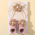 Close-up of baby beanie and knit socks set with cute corduroy floral decorations - Pink (3D)