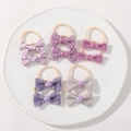 Set of 10 purple bow hair ties for toddlers with floral and lace textures in a ceramic plate - Purple Floral Openwork (set Of 10)