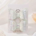 Close-up of handmade white lace butterfly hair clips with colorful sequins for children - White