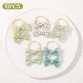 10-piece set of floral and green infant bow hair ties in an elegant ceramic tray - Light Green Floral Lace (set Of 10)