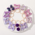 Purple multi-texture bow hair ties set for kids in a decorative white plate - Pink Purple Floral Pom Style