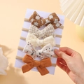5-piece set of nylon baby headbands featuring varied bow designs and floral embroidery - Multicolor Combo (5F)