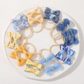 20-piece girls' hair tie set with yellow and blue fabric bows and soft pom-poms - Yellow And Blue Checkered Pom-poms (set Of 20)