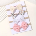 Set of 4 baby bow headbands with floral, stripe, and lace designs on nylon bands - Striped And Floral Fabric Style (4C)