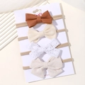 Nylon baby headband set with four bow styles in brown leather and lace on a white card - Brown Leather And Oatmeal Fabric Style (4H)