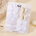 8-piece white bow hair clip set with lace and ribbon bows on display card - White