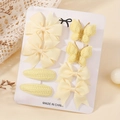 8-piece yellow kids hair clip set with grosgrain bows and knitted clips on card - Light Yellow