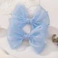 Coppia di fermagli per capelli in rete azzurra con pois d'argento e fiocco elegante - Azzurro