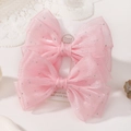 Set di due fiocchi per capelli in rete rosa con paillettes argentate su carta bianca - Rosa