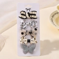 Set de 5 pinzas para el pelo de niña con lazos de cuadros, lunares y flores - Colección Lunares Negro Blanco Gris (5D)