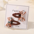 Floral embroidery bow hair clip set with brown woven pattern on white display card - Brown Woven Embroidery Style (2A-4)