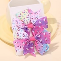 Pair of colorful gradient grosgrain bow hair clips featuring unicorn and heart patterns - Colorful Gradient Unicorn Style (2A-10)