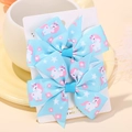 Set of two light blue grosgrain ribbon hair bows with unicorn and star prints - Blue Unicorn Style (2A-3)