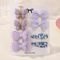 Lot de 8 barrettes à cheveux violettes pour enfants avec nœuds en tissu sur carte de présentation - Série Violette (8E)