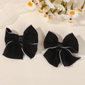 Pair of black fabric bow hair clips with white edge stitching for girls - Black with White Edge