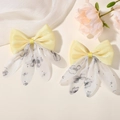 Elegant pair of yellow fabric bow hair clips with white floral mesh tassels and pearls - Yellow