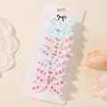 Kids bow hair clip set in blue, pink, and purple lace fabric on a display card - 8B Multicolor