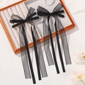 Lot de deux barrettes à nœud en mousseline noire avec longs rubans et dentelle - Noir