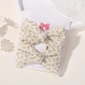 Set di mollette per capelli con fiocchi floreali verdi per bambine su carta bianca - Floreale Verde Bianco