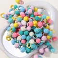 Cute multi-color plush pom-pom hair ties in a vibrant pastel pack for girls and women - Multi-color Mixed Macaron (50D)