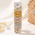 Grazioso set da 8 pezzi di mollette per capelli bimba con margherite e quadri gialli - Floreale Giallo