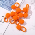 Cute set of eight bright orange plush pom pom elastic hair ties for girls on marble - Bright Orange Style (10A-23)