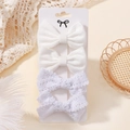 3-piece set of white ribbon bows and lace hair clips for toddlers on a display card - White