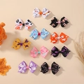 Set of 10 Halloween hair clips with ghosts and pumpkins on colorful grosgrain ribbons - Assorted Holiday Pattern Variety
