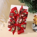 Lot de deux nœuds de Noël rouges avec motif Casse-Noisette sur carte de support - Nœud Rouge Casse-Noisette (2A-17)