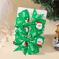 Paire de nœuds de Noël verts avec motifs Père Noël et flocons sur barrettes - Imprimé Père Noël Vert et Pois (2A-9)