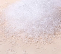 Transparent high elastic disposable rubber bands for hair styling in bulk pile - Clear