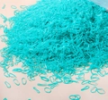 High elasticity mint green disposable hair bands in a bulk pack for various hairstyles - Mint Green