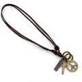 Vintage leather peace sign and cross pendant necklace with bronze charms on white background - Brown