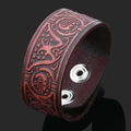 Handmade vintage Viking leather bracelet for men featuring red Celtic embossed patterns - Coffee